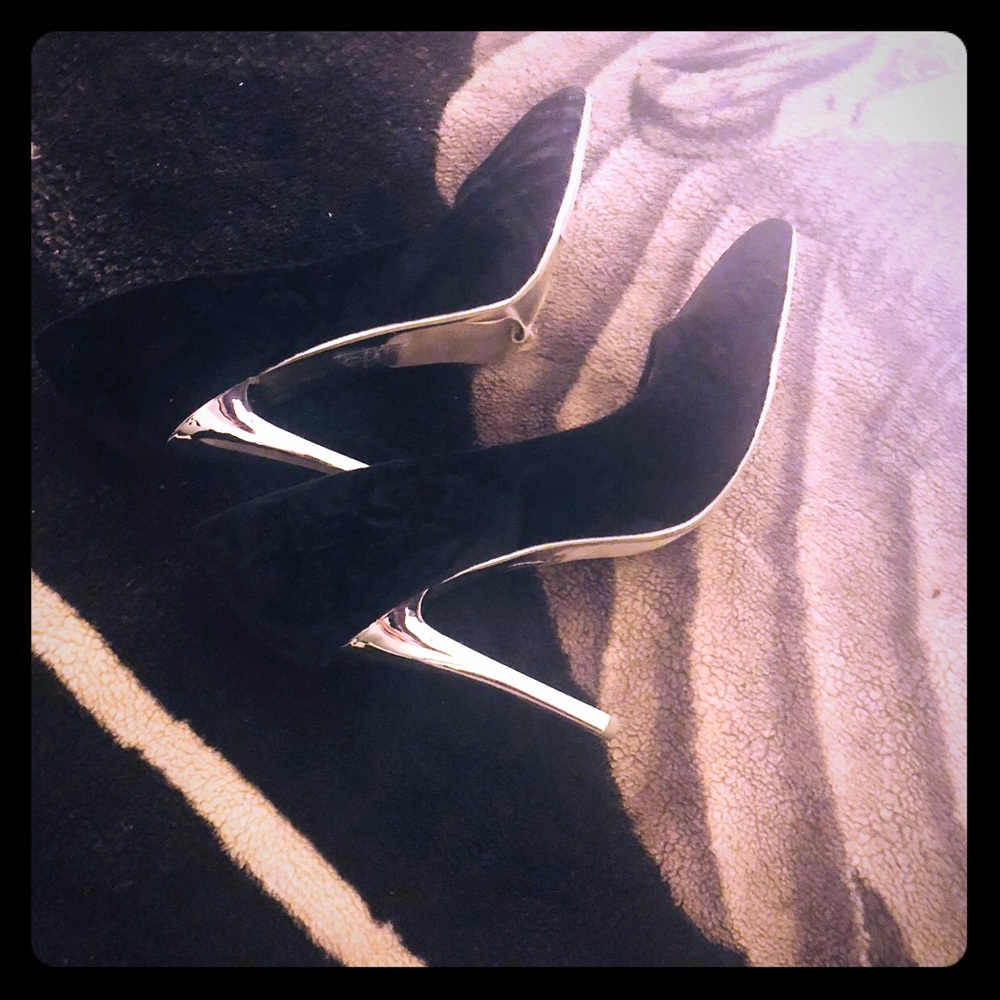 Black silhouette pumps